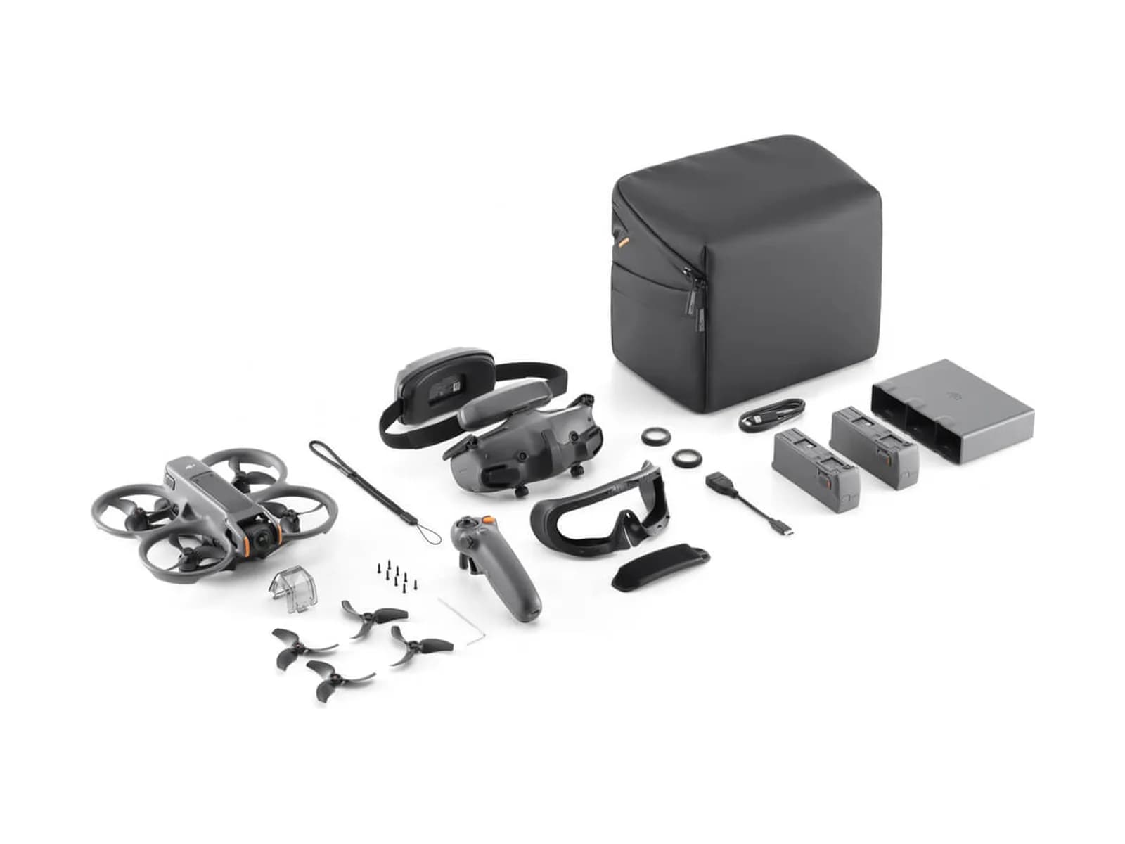 Contenu complet du pack DJI Avata 2 Fly More Combo disposé à plat sur fond blanc