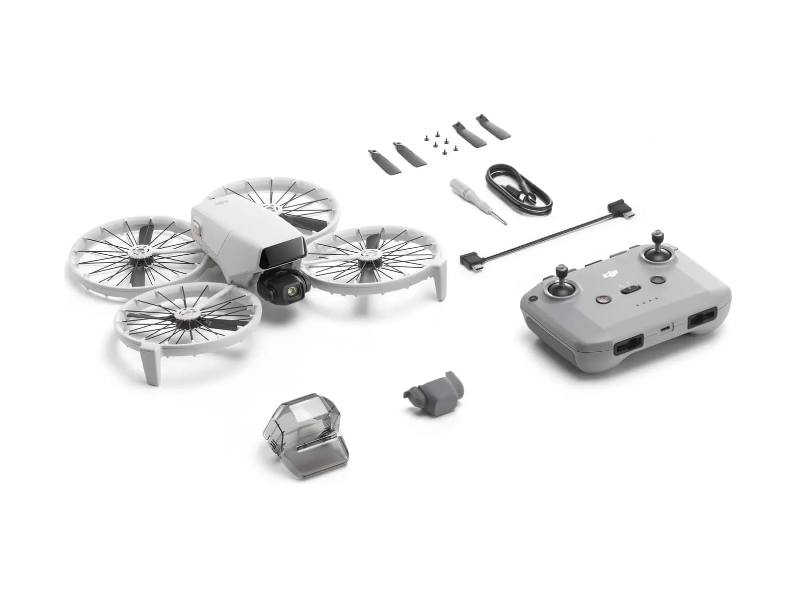 Contenu complet du pack DJI Flip (RC-N3) disposé à plat sur fond blanc