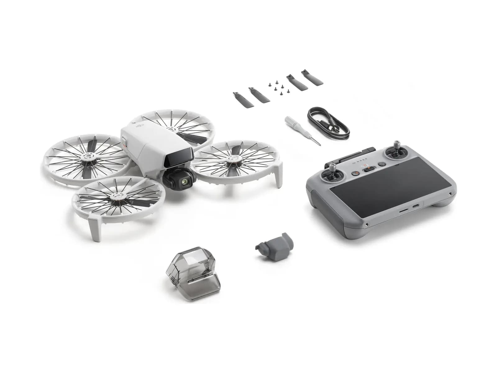 Contenu complet du pack DJI Flip (RC 2) disposé à plat sur fond blanc