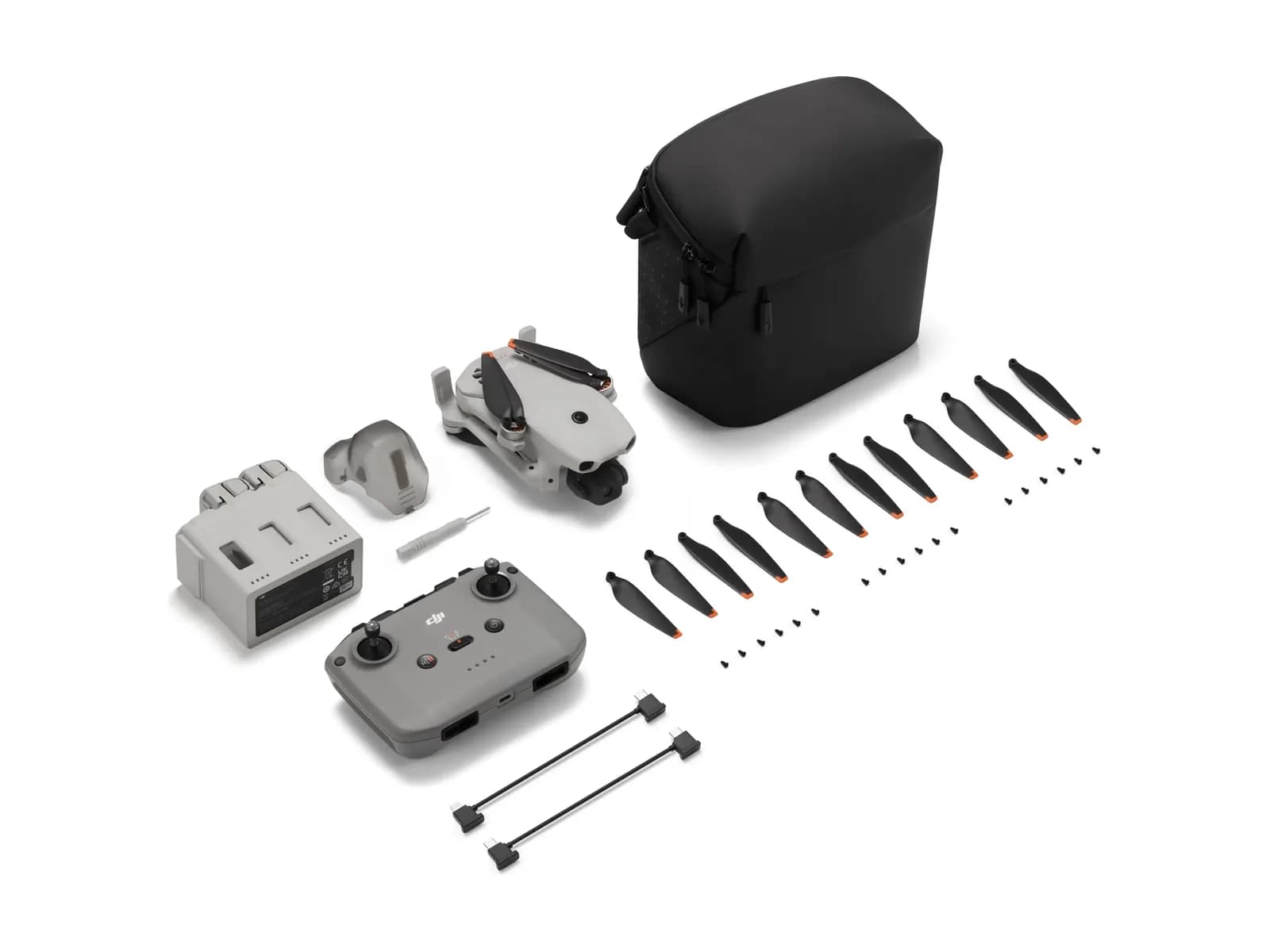 Contenu complet du pack DJI Lito 1 Fly More Combo (RC-N3) disposé à plat sur fond blanc