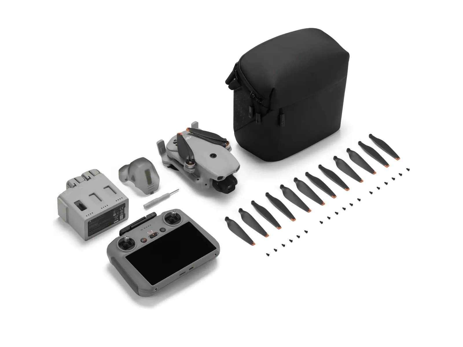 Contenu complet du pack DJI Lito X1 Fly More Combo Plus (RC 2) disposé à plat sur fond blanc