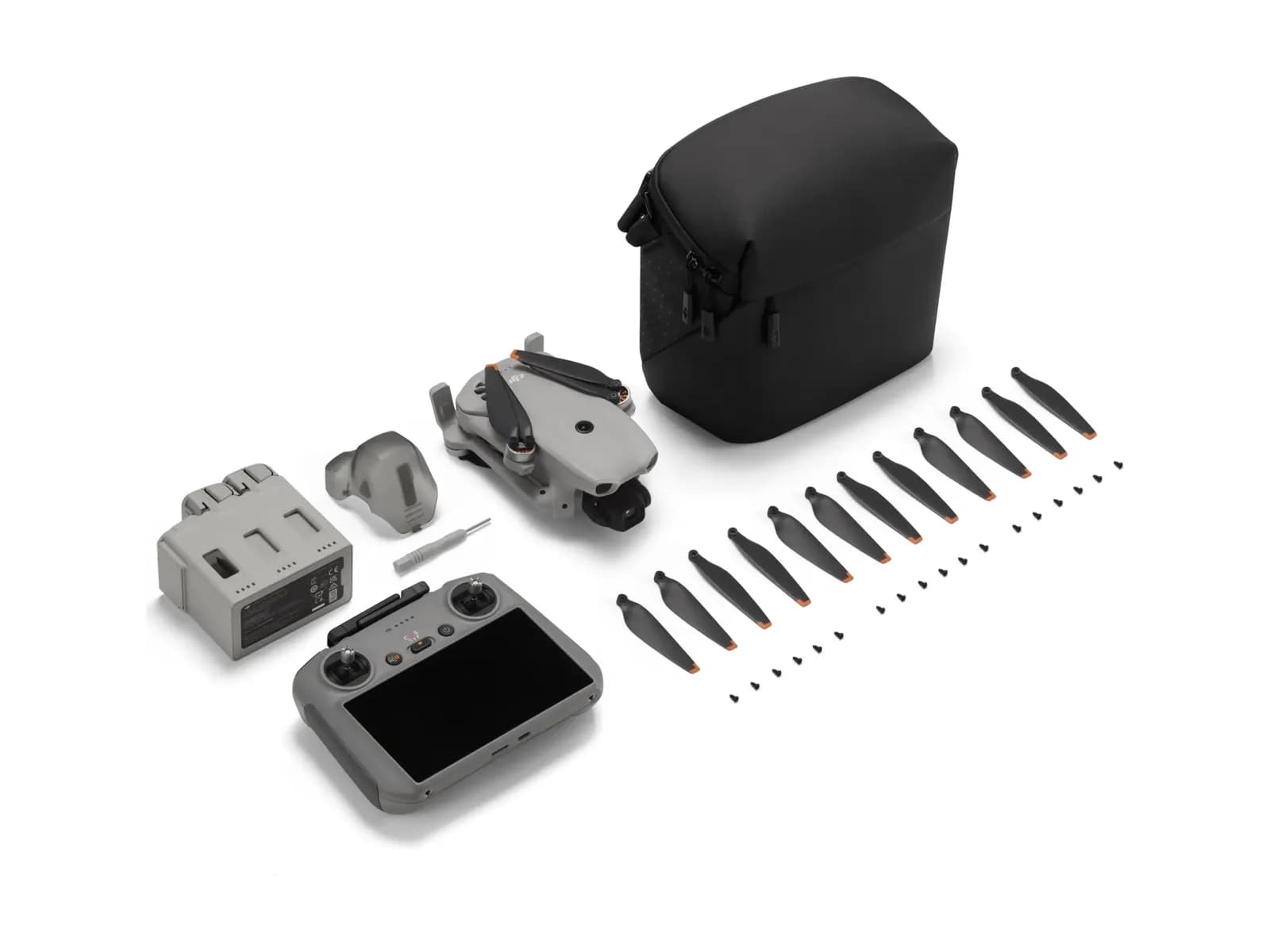 Contenu complet du pack DJI Lito X1 Fly More Combo (RC 2) disposé à plat sur fond blanc