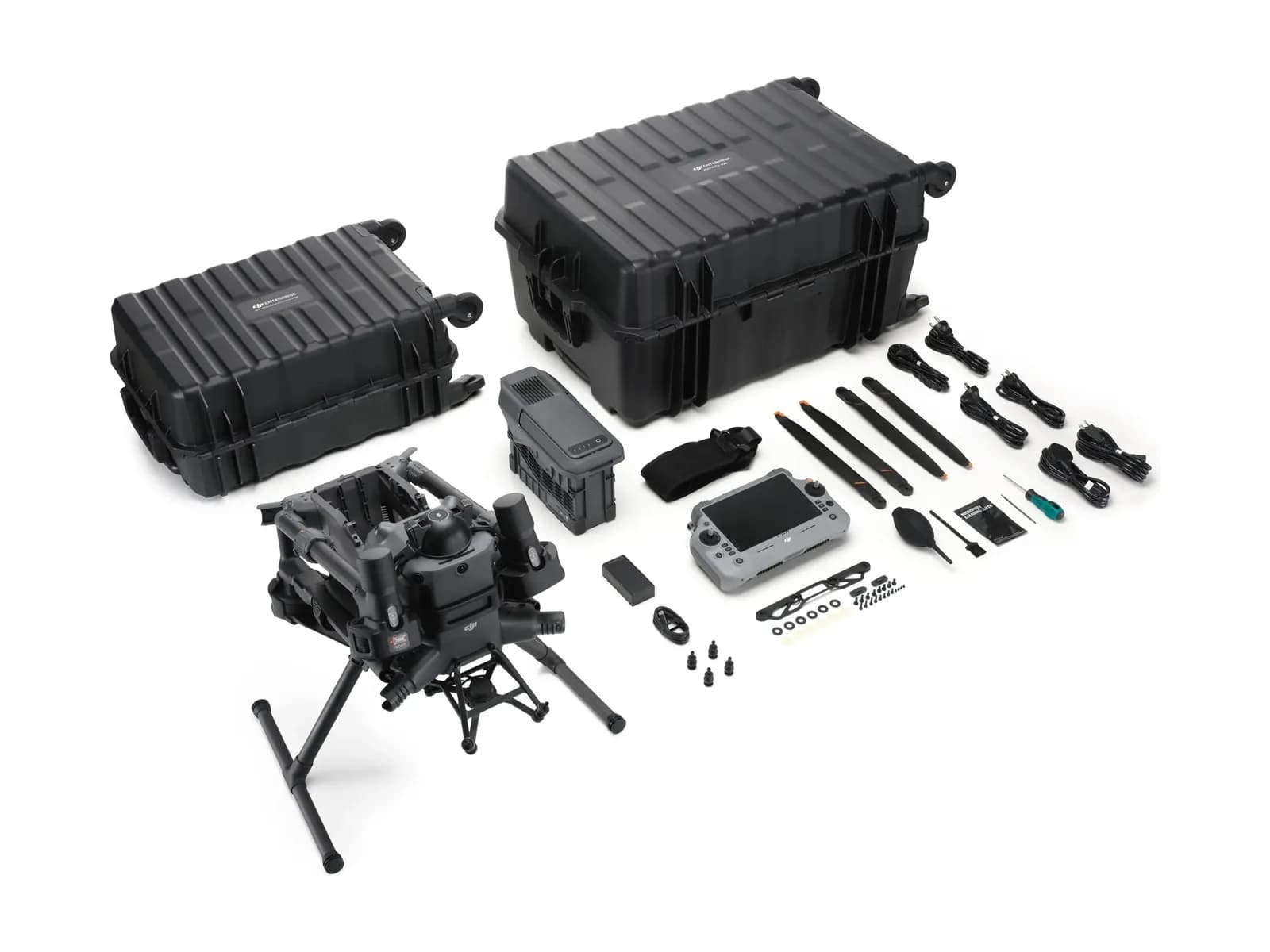 Contenu du DJI Matrice 400 : drone, radiocommande, valise et accessoires sur fond blanc